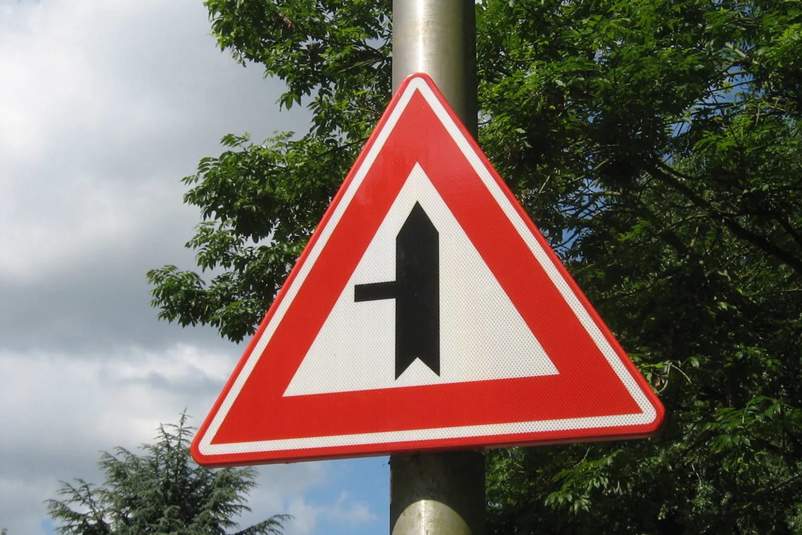 A bilingual street sign showing two languages.