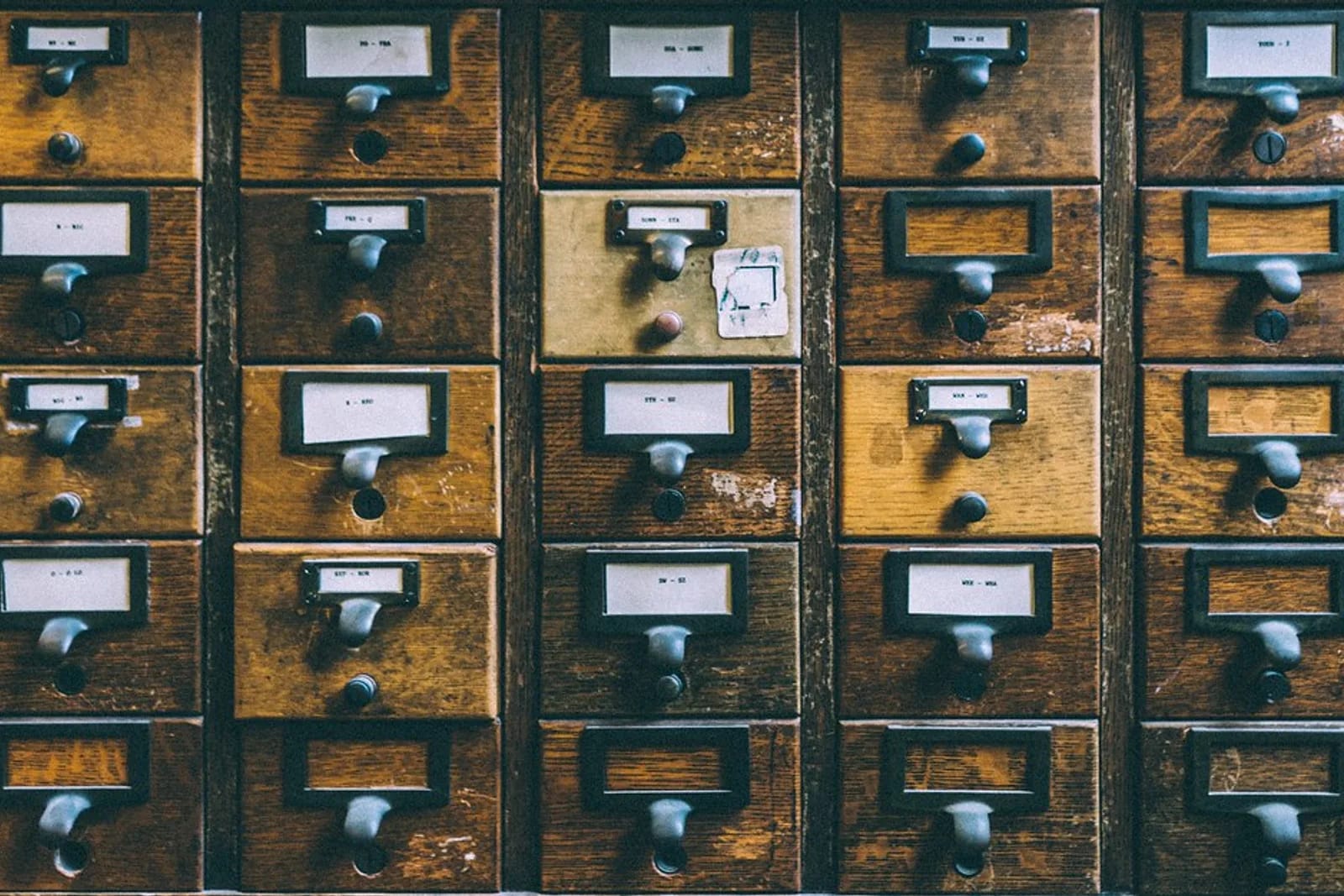 A card-catalog index drawer with labeled cards.