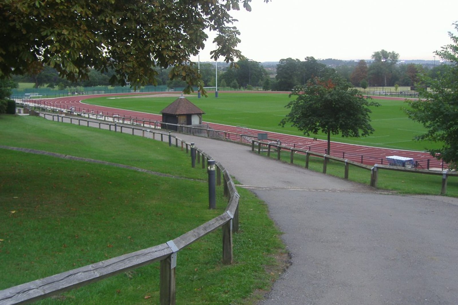 An empty athletics track marked with lanes.